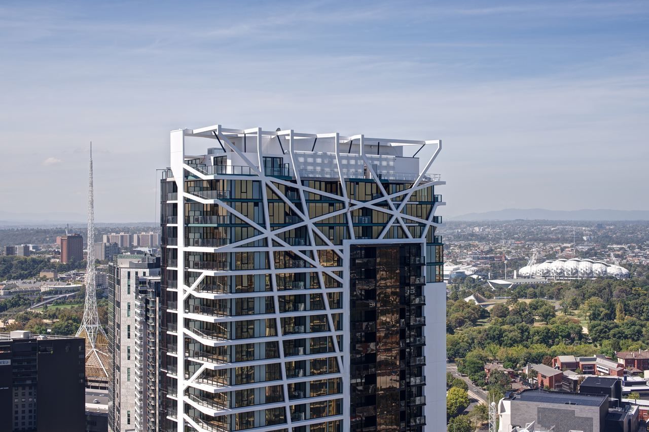 WRAP Residences, Southbank — white lattice crown above the Melbourne skyline