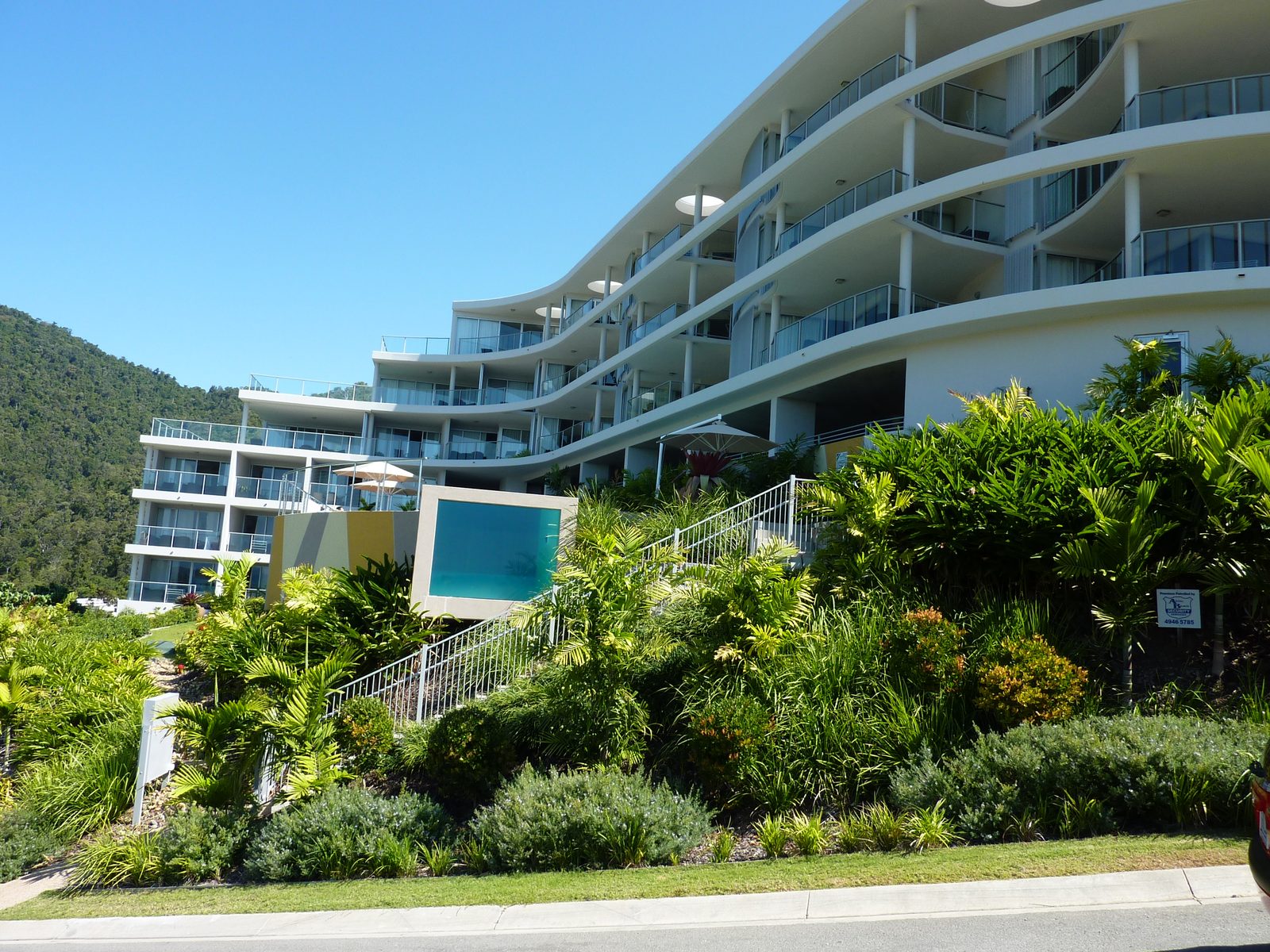 Airlie Summit, Airlie Beach, QLD — exterior finishes streetview apartment building