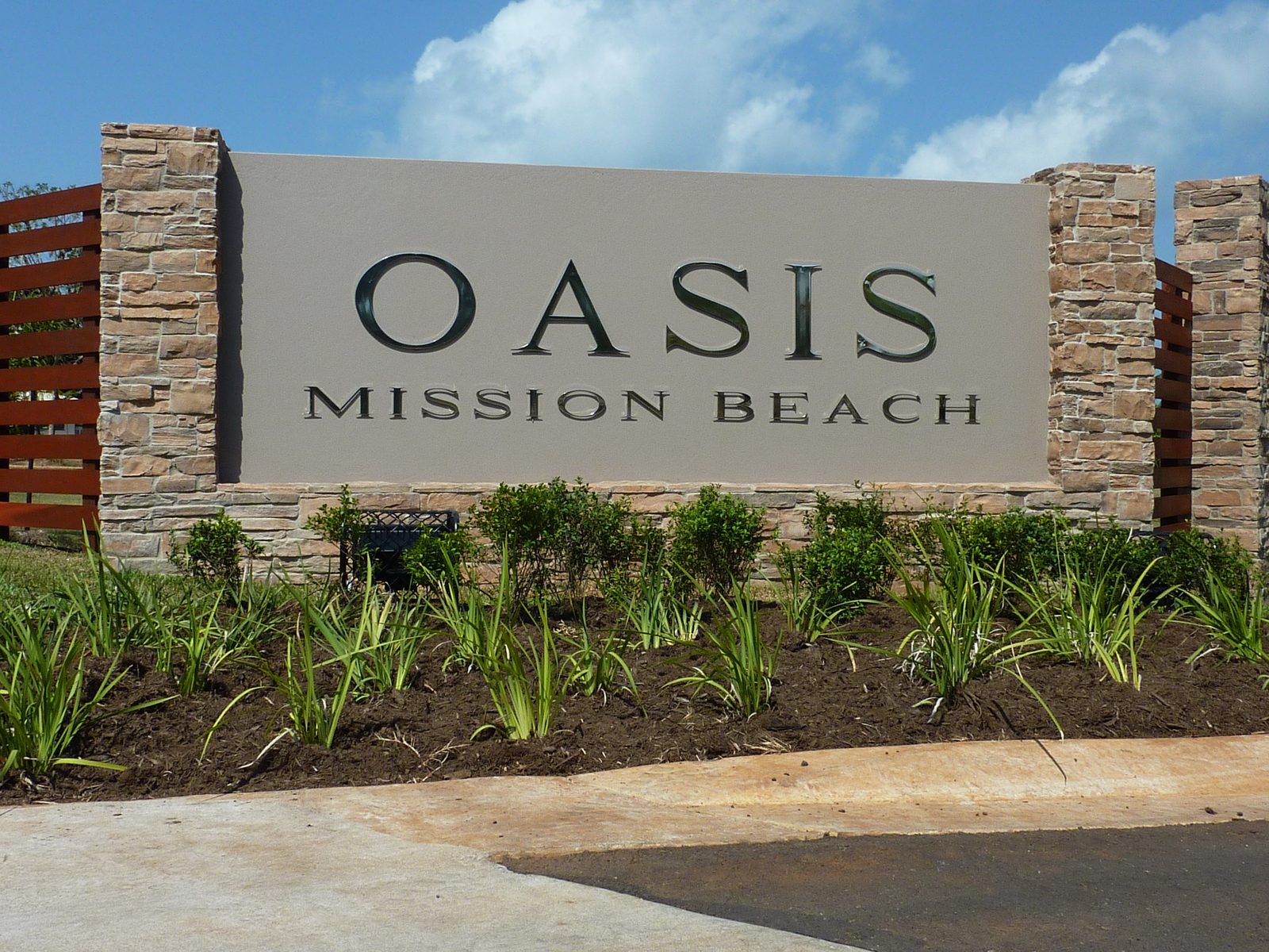 Oasis, Mission Beach, QLD — exterior finishes oasis signage 2